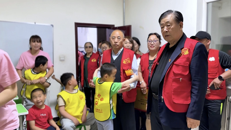 手拉手同岀援手 心連心共獻愛心 ——內蒙古赤峰市元寶山區平莊城區星海社區關工委助殘日活動