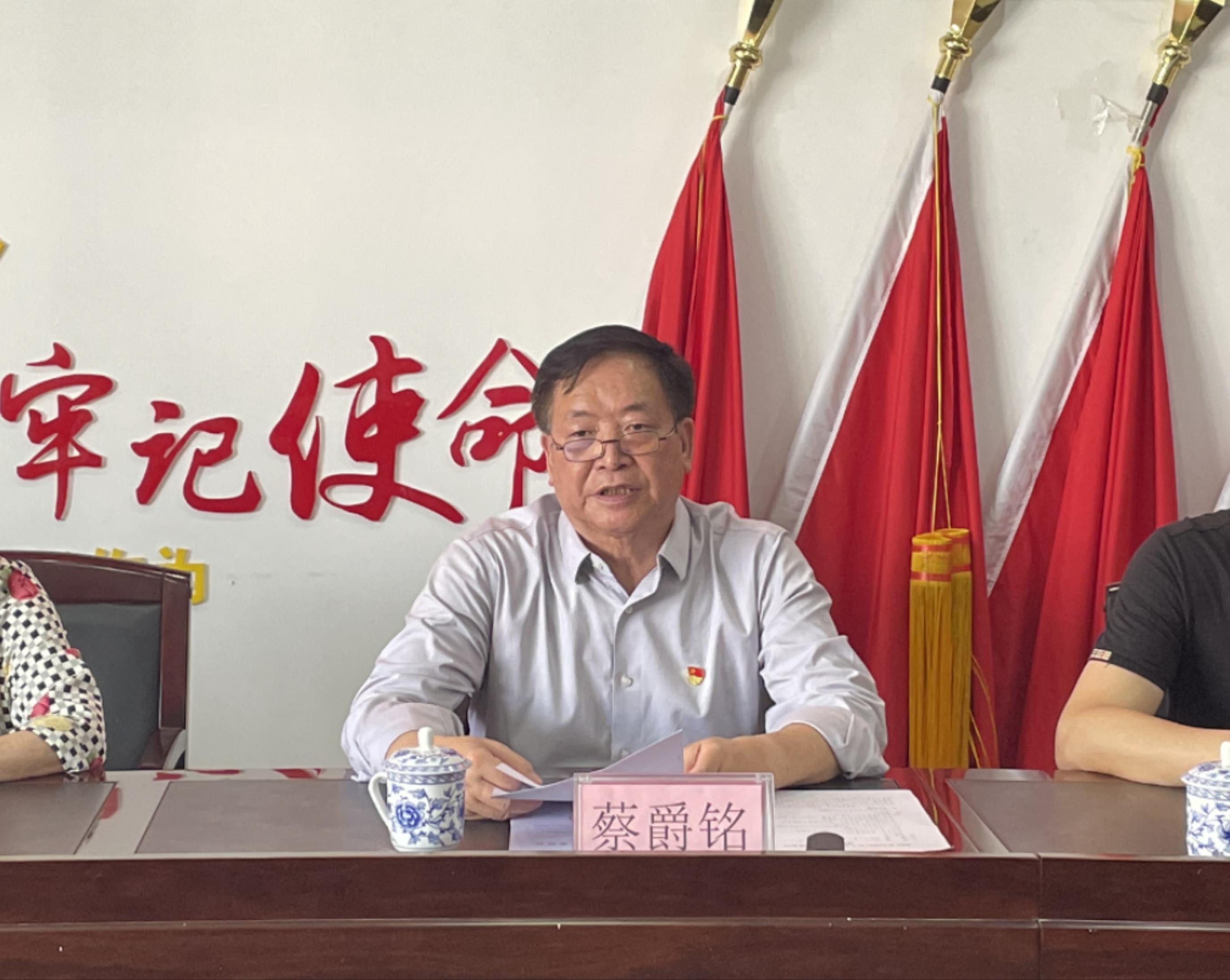 區關工委執行主任蔡爵銘同志作報告.jpg